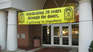 20th anniversary banner at front door of Jay County Public Library
